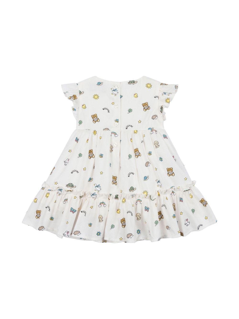 Abito con stampa per neonata Moschino Kids bianco con orlo svasato - Rubino Kids
