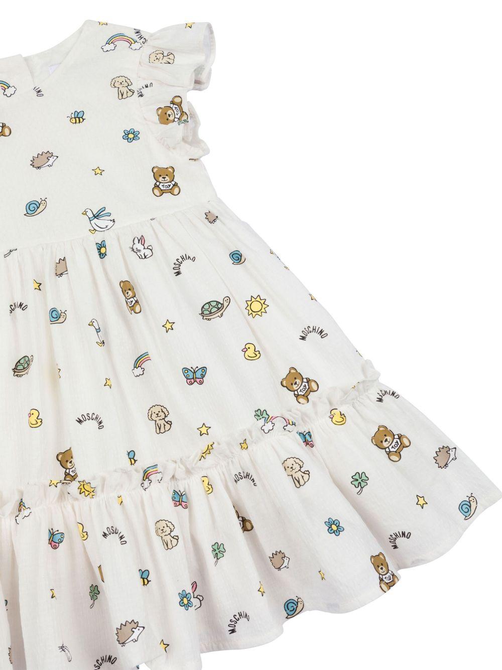 Abito con stampa per neonata Moschino Kids bianco con orlo svasato - Rubino Kids