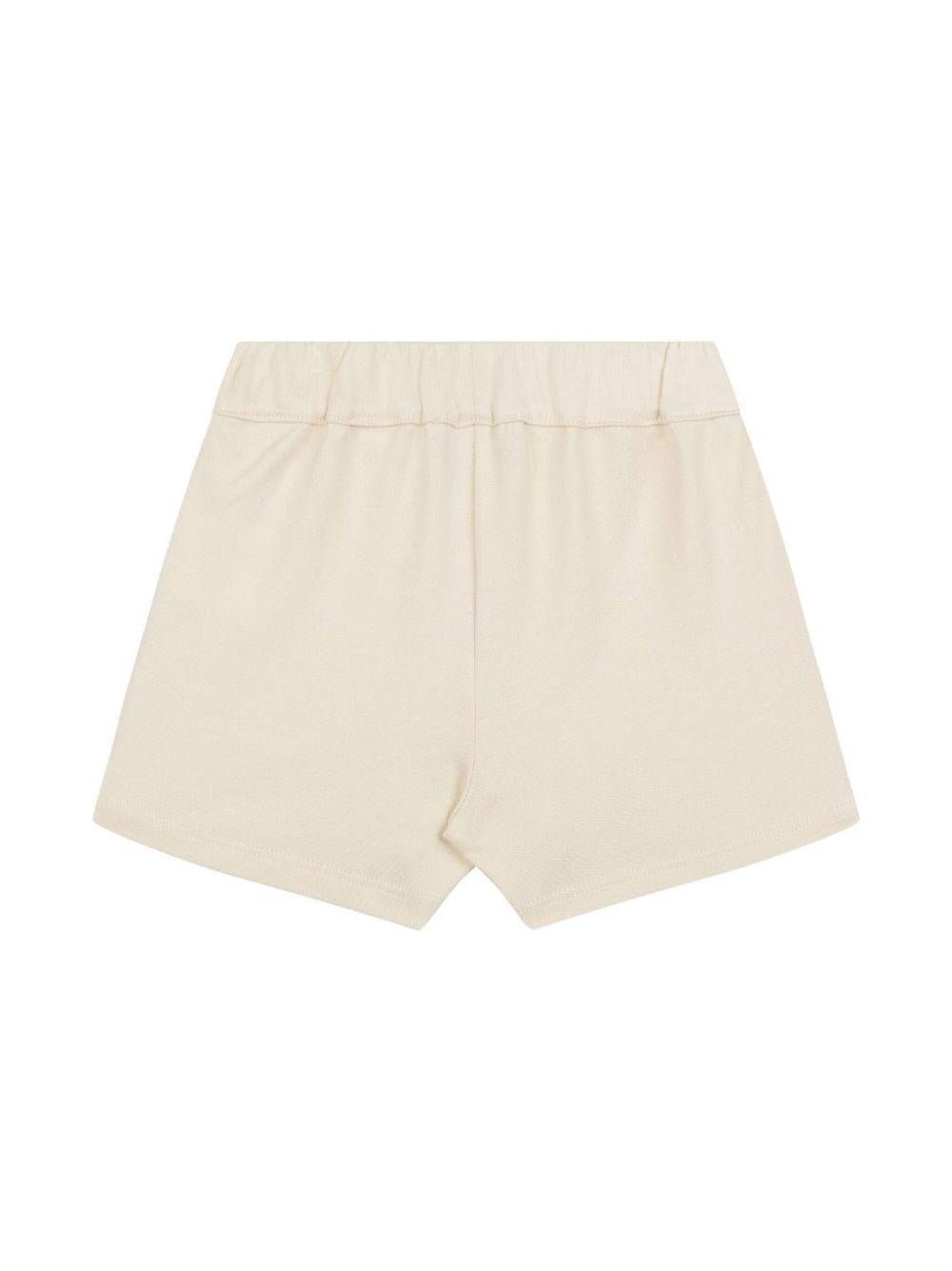 Bermuda con logo per neonato Moschino Kids beige con vita elasticizzata - Rubino Kids