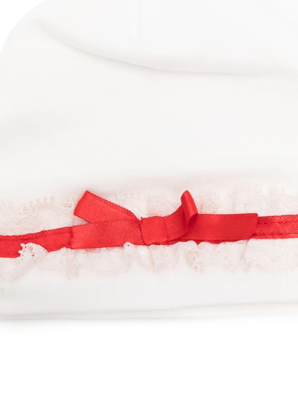 Berretto per neonata Monnalisa bianco con nastro rosso - Rubino Kids