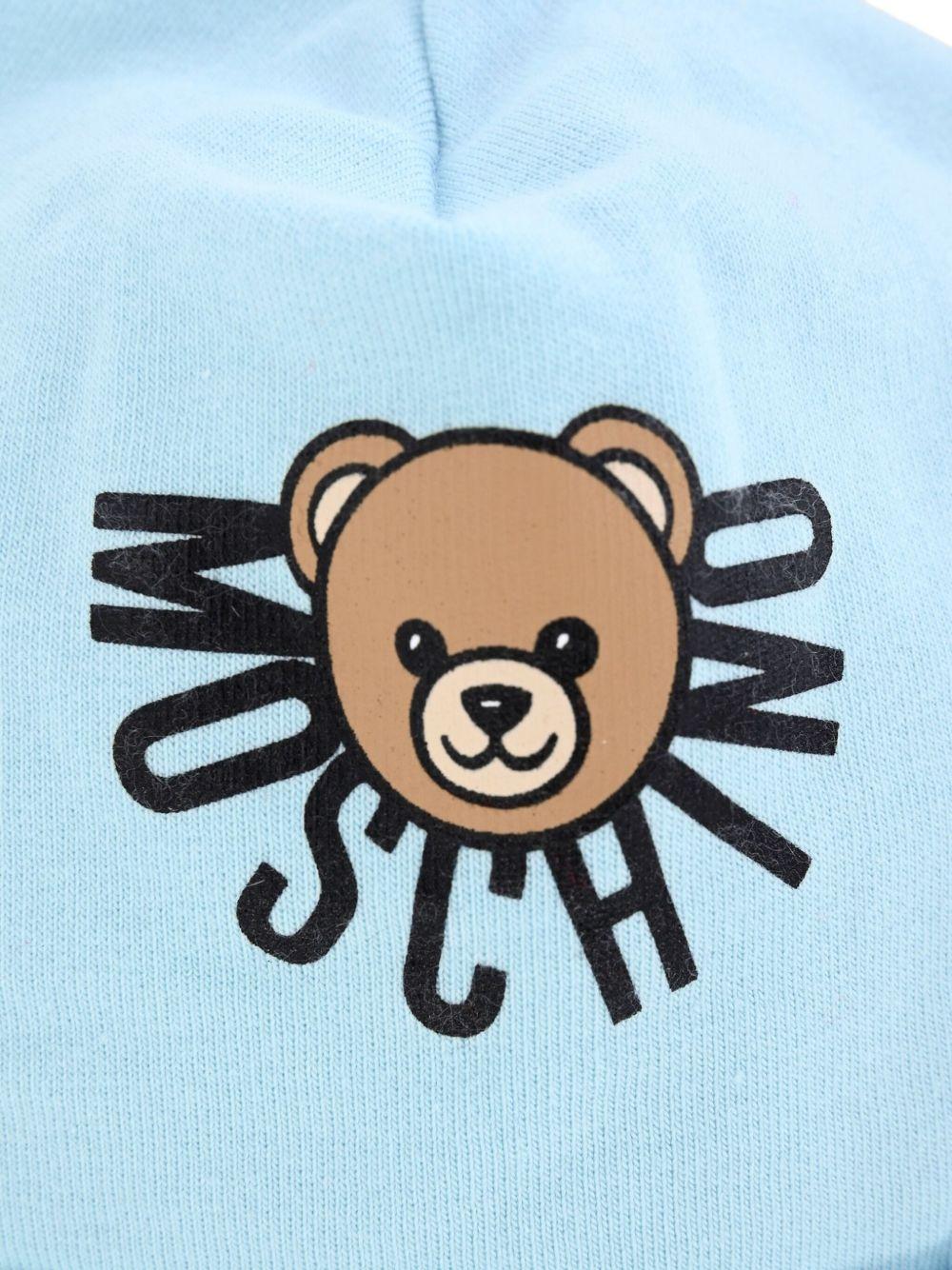 Berretto per neonati Moschino Kids azzurro con stampa teddy - Rubino Kids