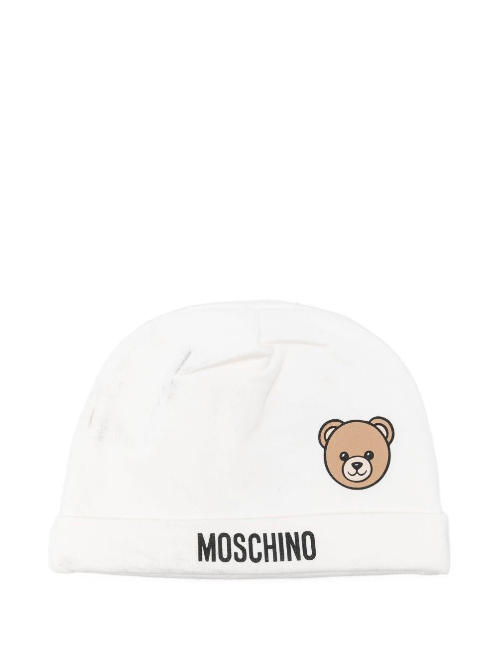 Berretto per neonati Moschino Kids bianco con logo Teddy - Rubino Kids