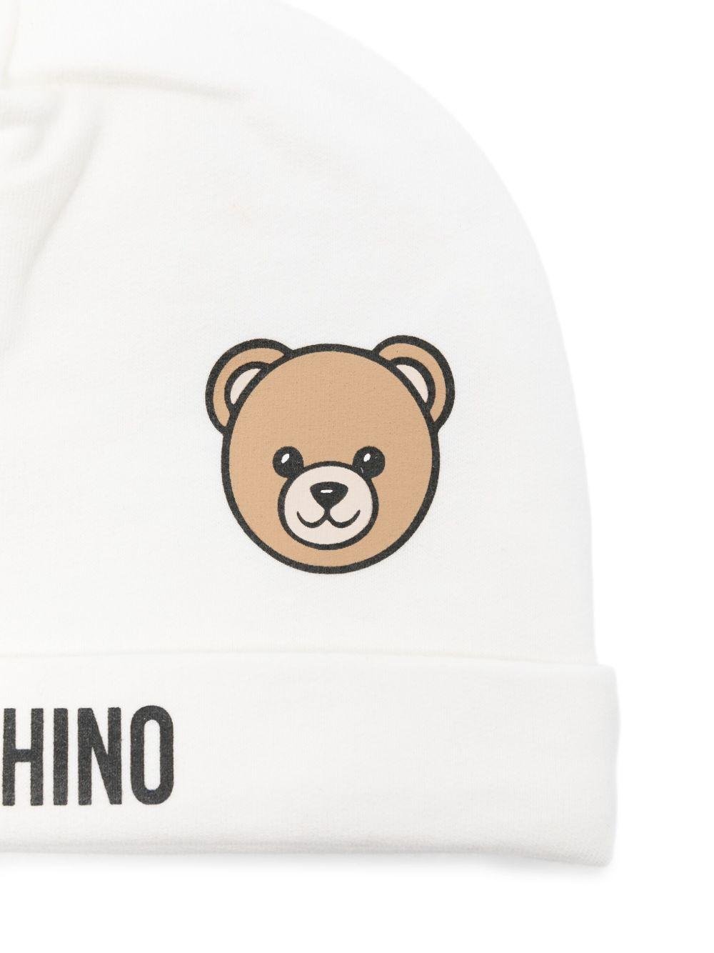 Berretto per neonati Moschino Kids bianco con logo Teddy - Rubino Kids