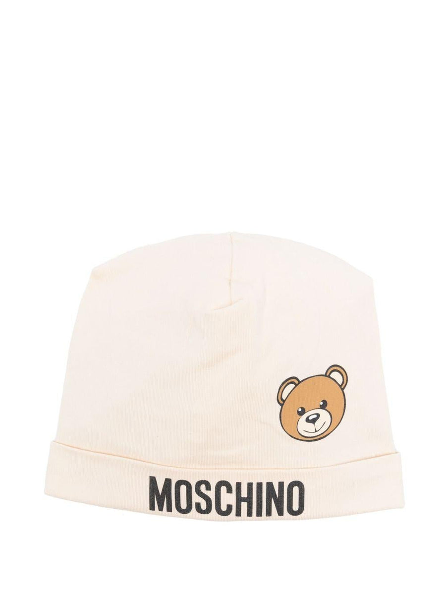 Moschino Kids beige baby hat with logo print and teddy bear
