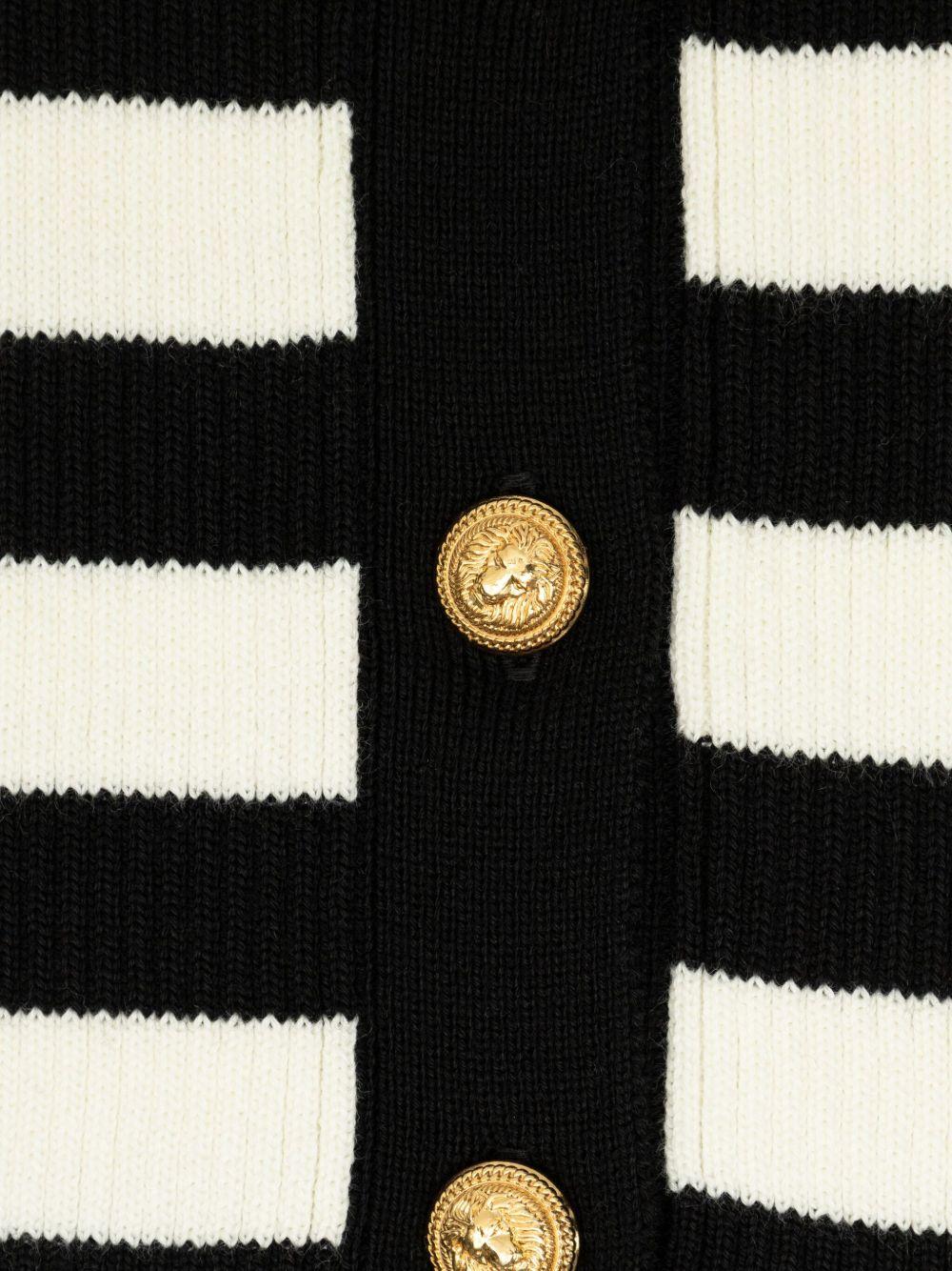 Cardigan a righe per bambina Balmain Kids bianca e nera con lavorazione in maglia - Rubino Kids