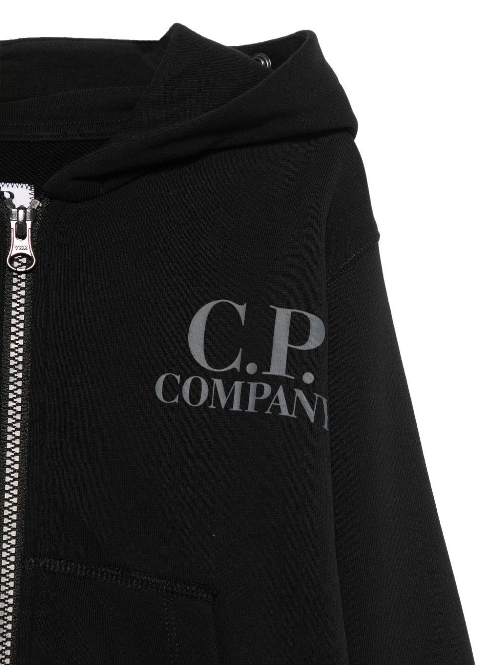 Felpa con occhialini sul cappuccio per bambino C.P. Company Kids nero con tasche frontali - Rubino Kids