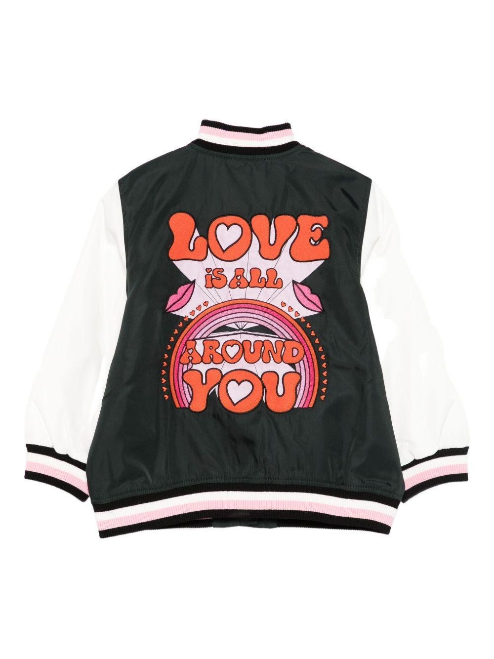 Giacca per bambina Stella McCartney Kids varsity Love nero con applicazioni - Rubino Kids