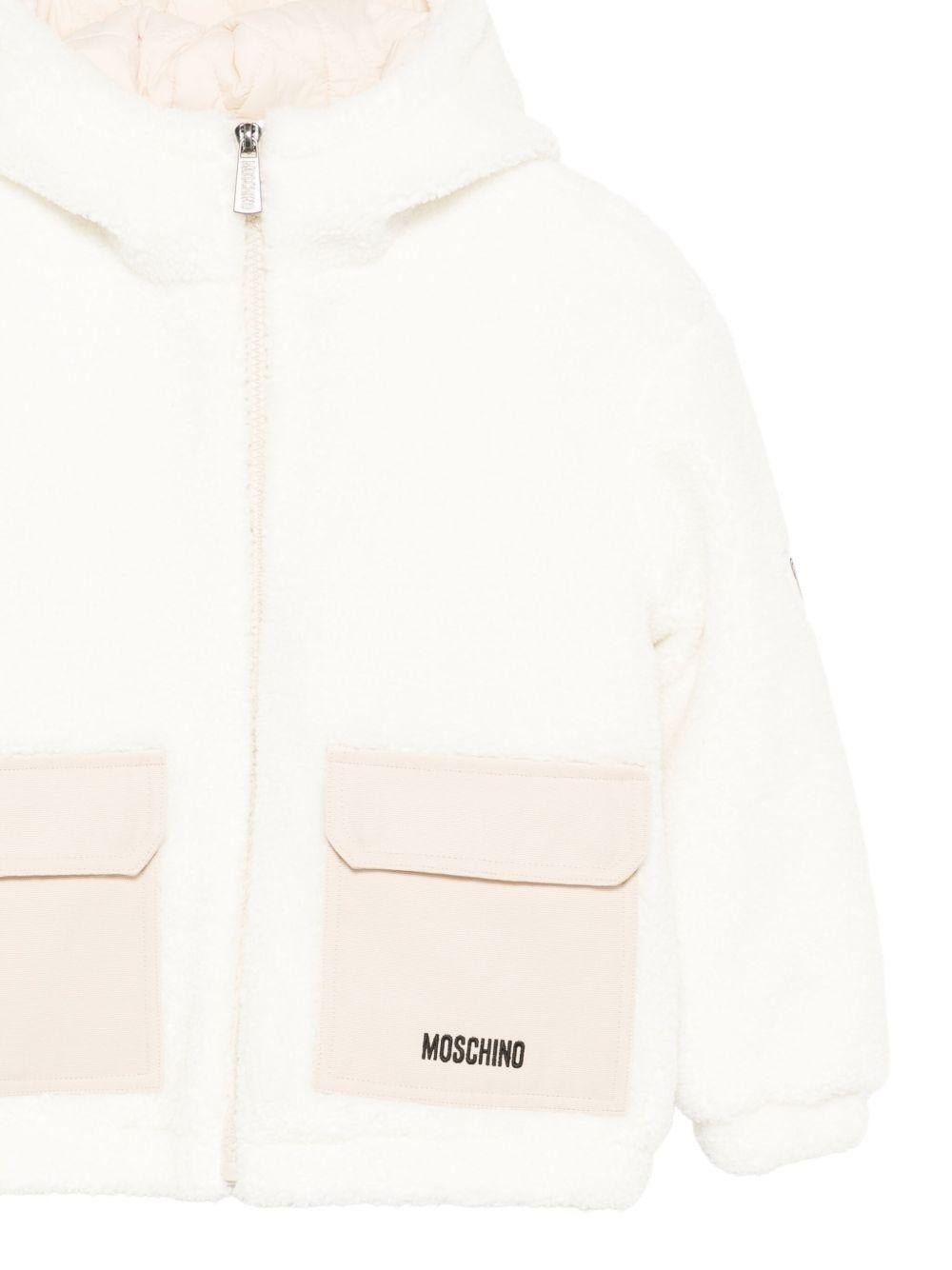 Giacca per bambino Moschino Kids bianco con cappuccio e logo - Rubino Kids