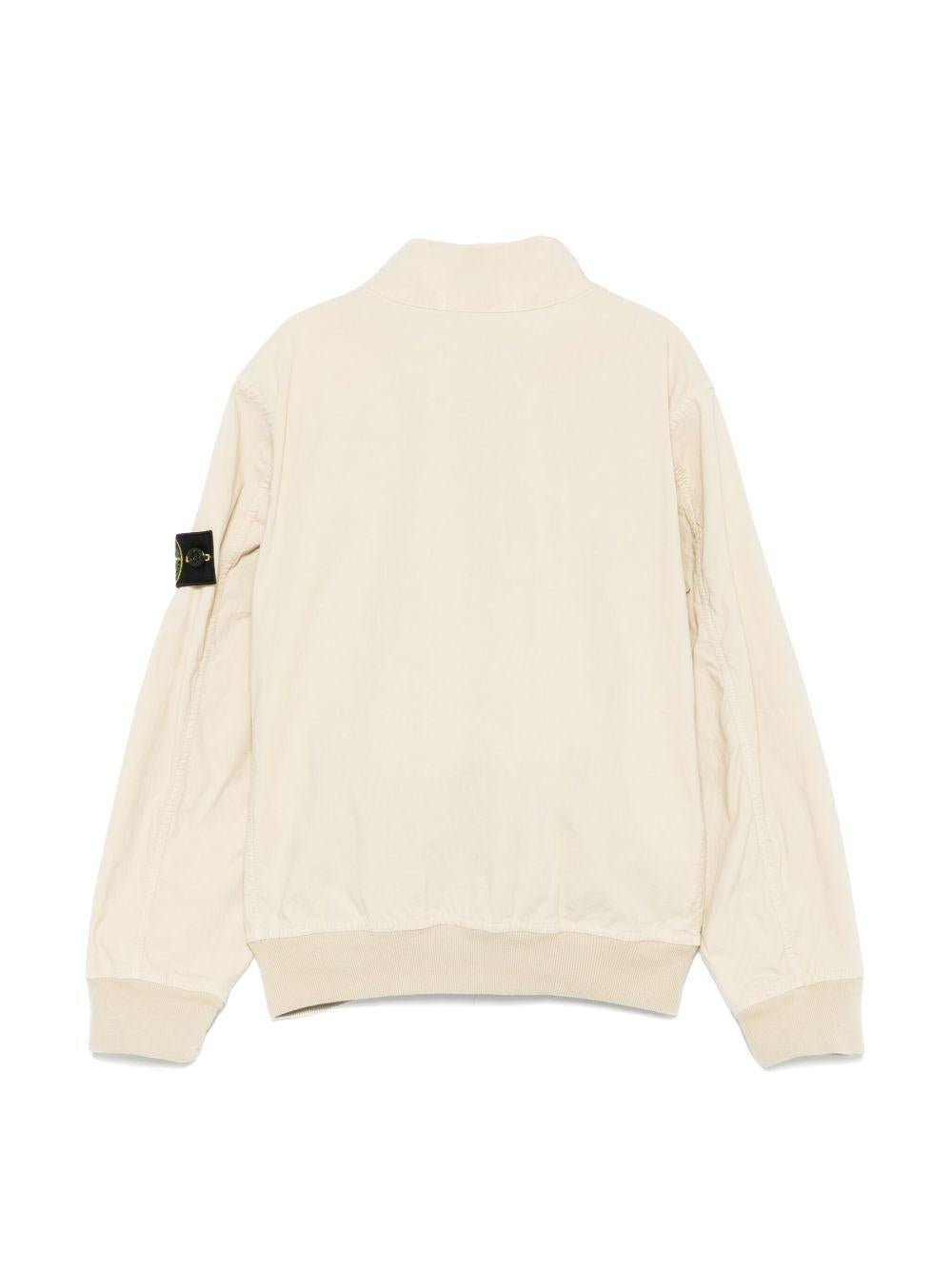 Giacca per bambino Stone Island Junior beige con applicazione Compass - Rubino Kids