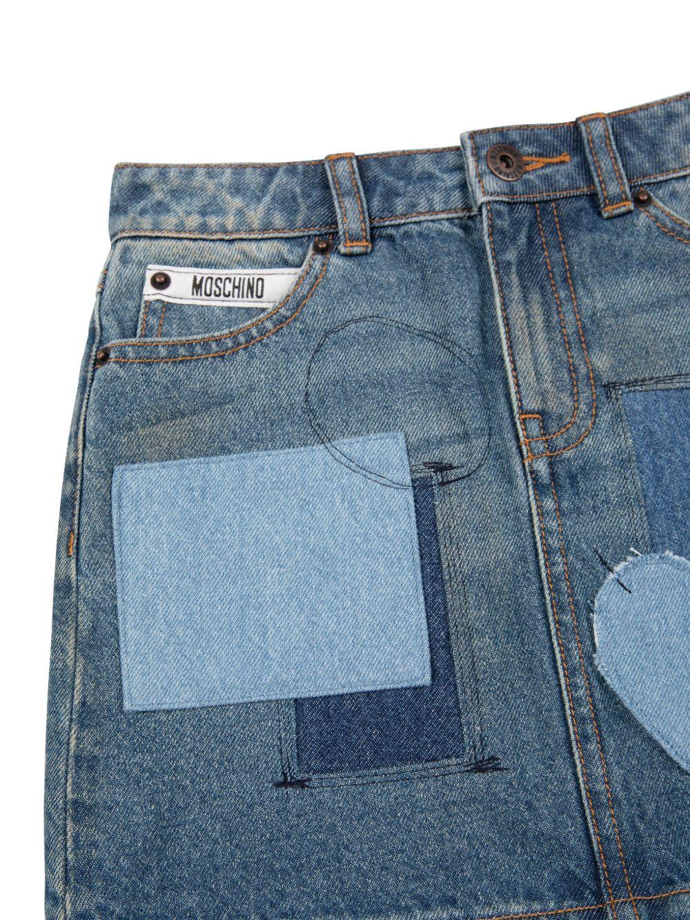 Gonna per bambina Moschino Kids denim con chiusura frontale con bottoni e zip - Rubino Kids