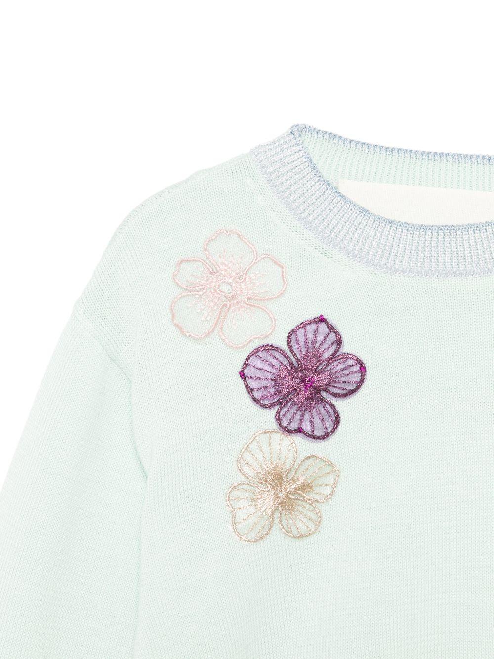 Maglione per bambina Simonetta azzurro con applicazioni floreali SY9A20 X0018 700 SIMONETTA