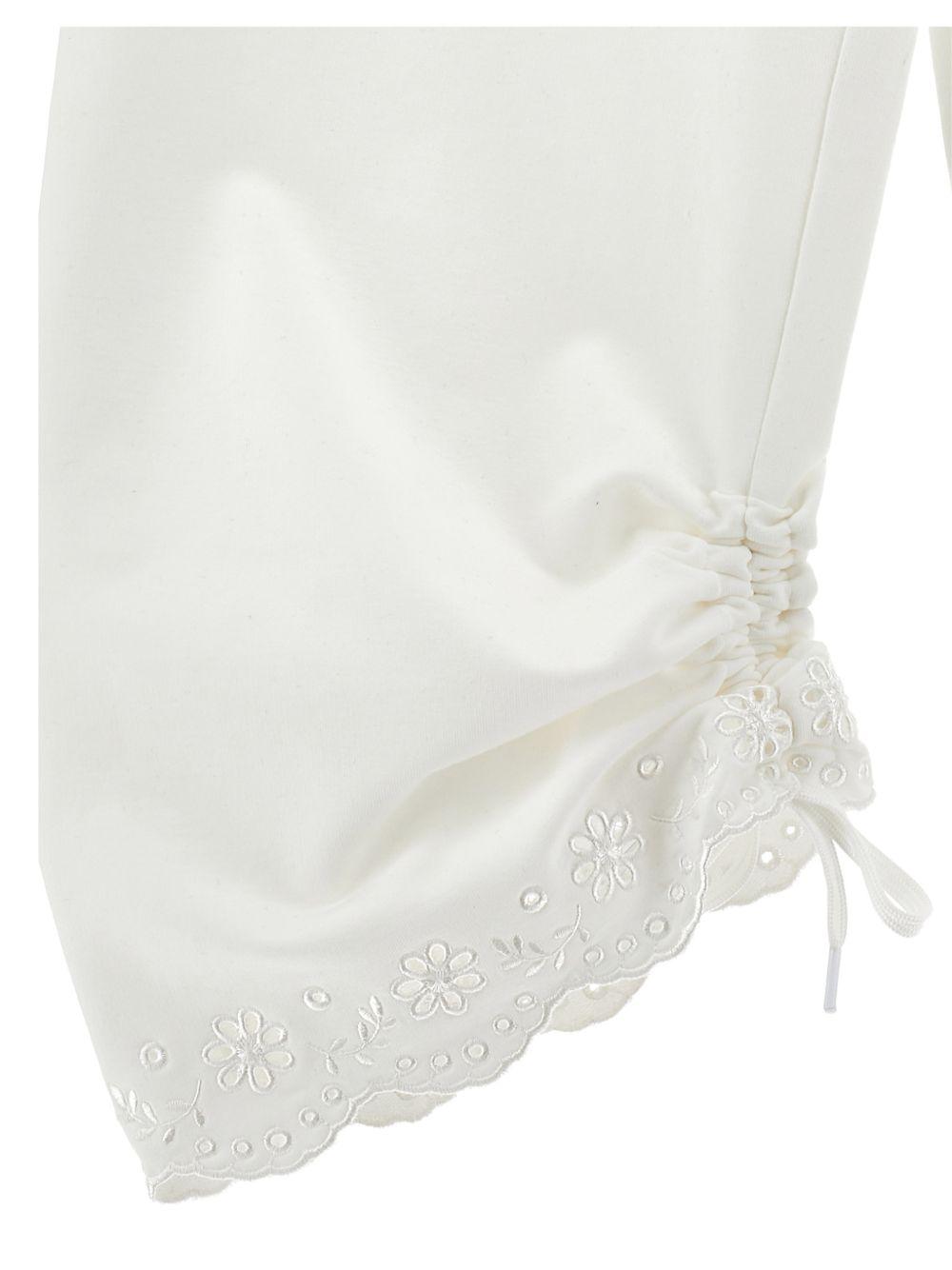 Pantaloni per bambina Monnalisa bianchi con ricamo a fiori 17G400 7014 0001 MONNALISA