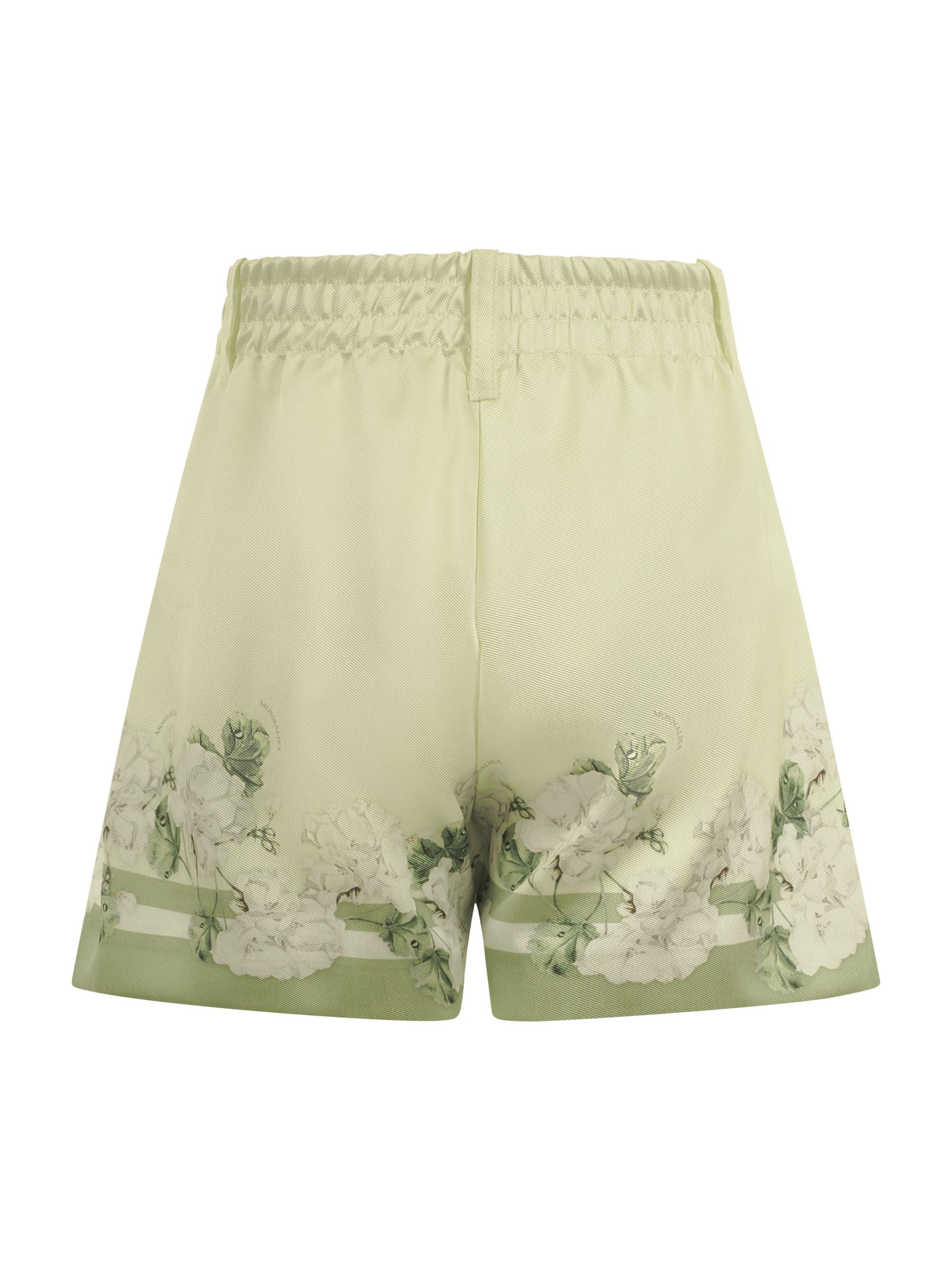 Shorts per bambina Monnalisa verde chiaro con stampa grafica a fiori 71G405 7651 0020 MONNALISA