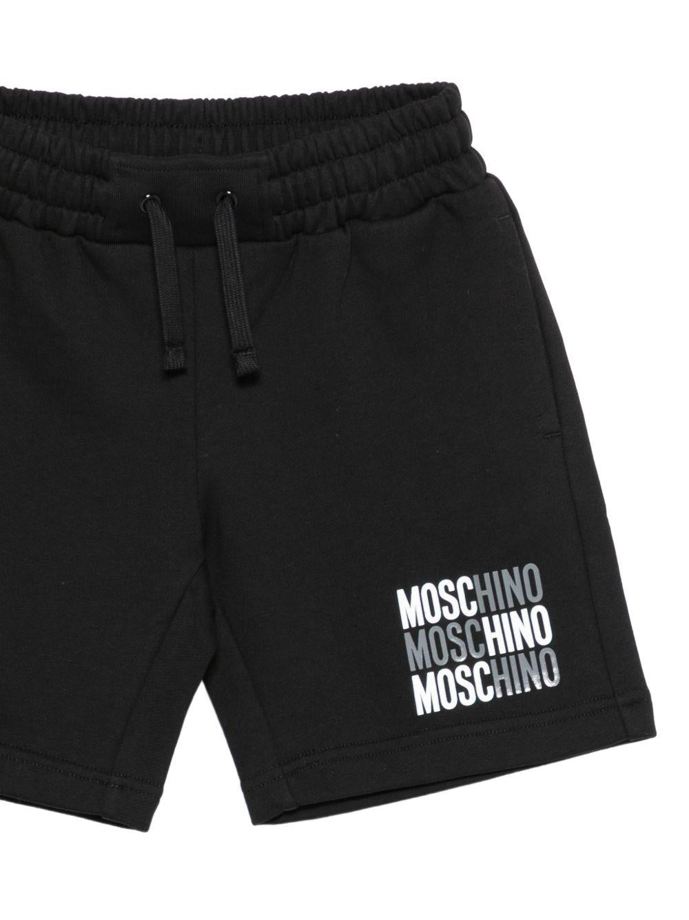 Completo per bambino Moschino Kids nero con logo sul davanti HMG00RLCA32 60100 MOSCHINO KIDS
