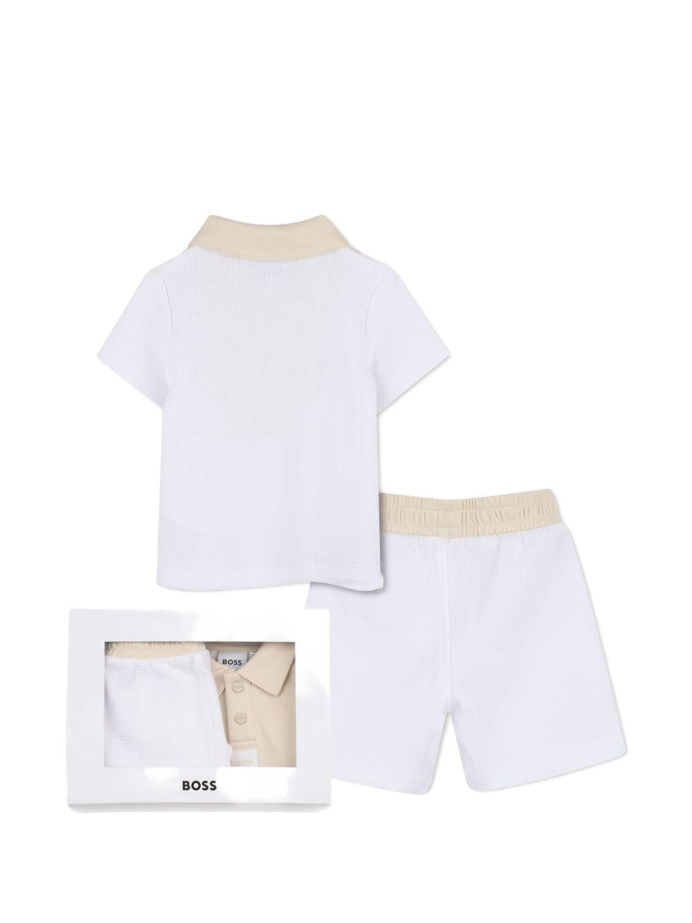 Set polo e shorts per neonato BOSS Kids bianco con logo J53047 10P BOSS KIDS