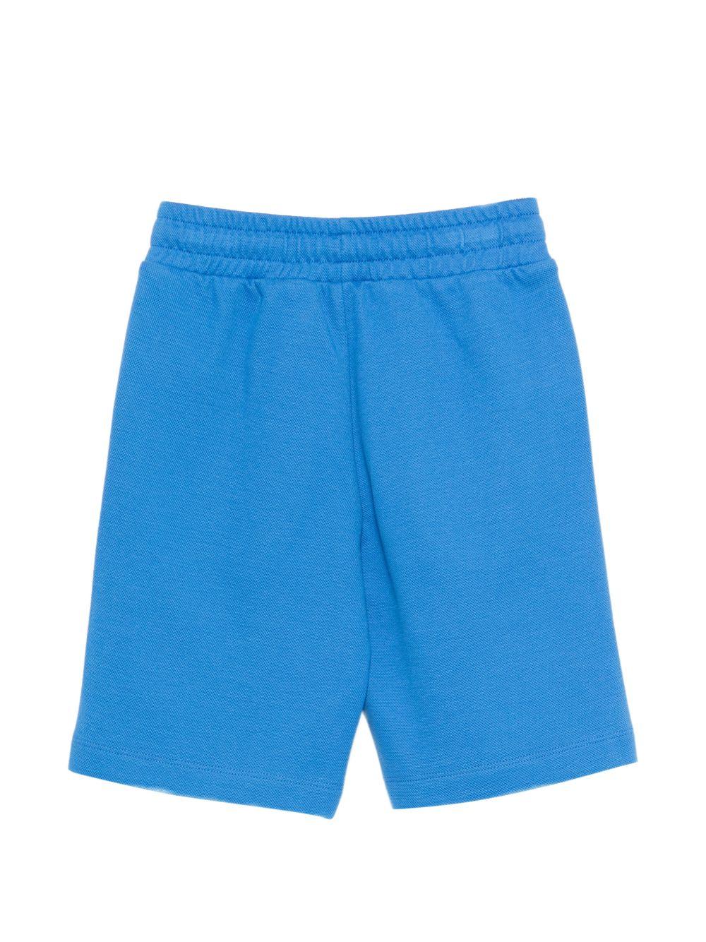 Shorts per bambino Moschino Kids azzurri con logo sul davanti HUQ02LLCA90 40630 MOSCHINO KIDS
