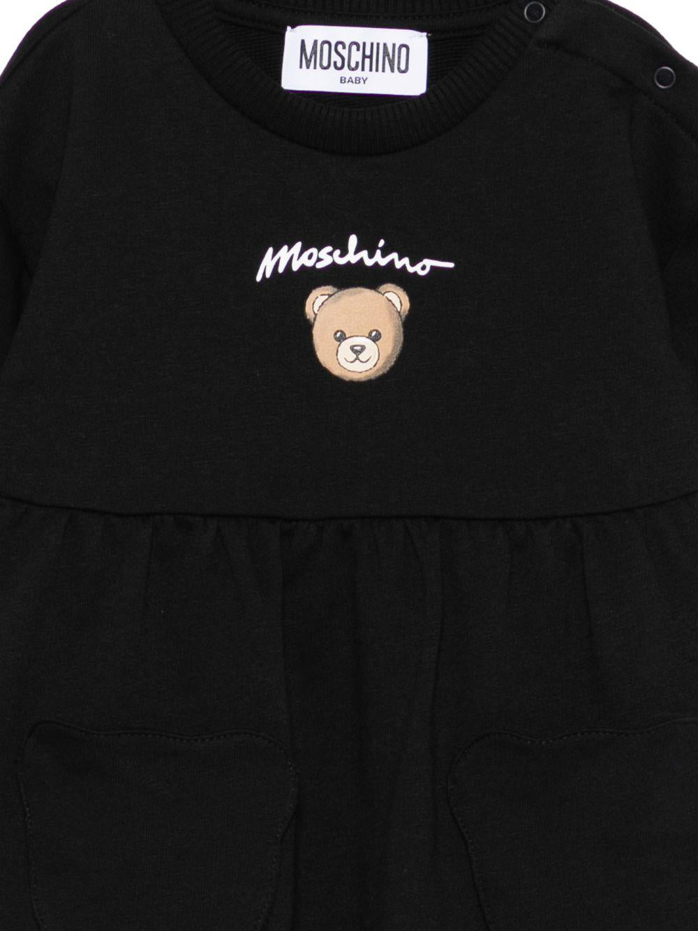 Abito per neonata Moschino Kids nero con logo sul davanti MDV0DGLCA19 60100 MOSCHINO KIDS