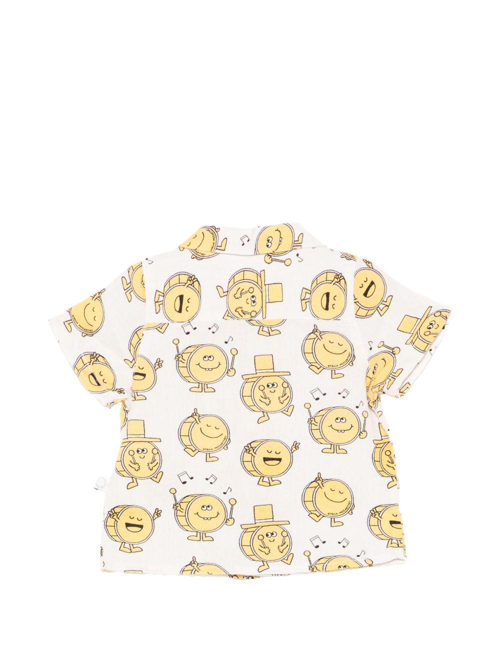 Camicia per neonato Stella McCartney Kids bianca con stampa tamburelli all-over TY5501 Z3606 101MC STELLA McCARTNEY KIDS