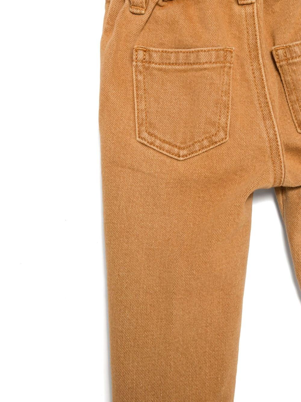 Jeans Leo Teddy per neonato Moschino Kids beige con passanti per cintura - Rubino Kids