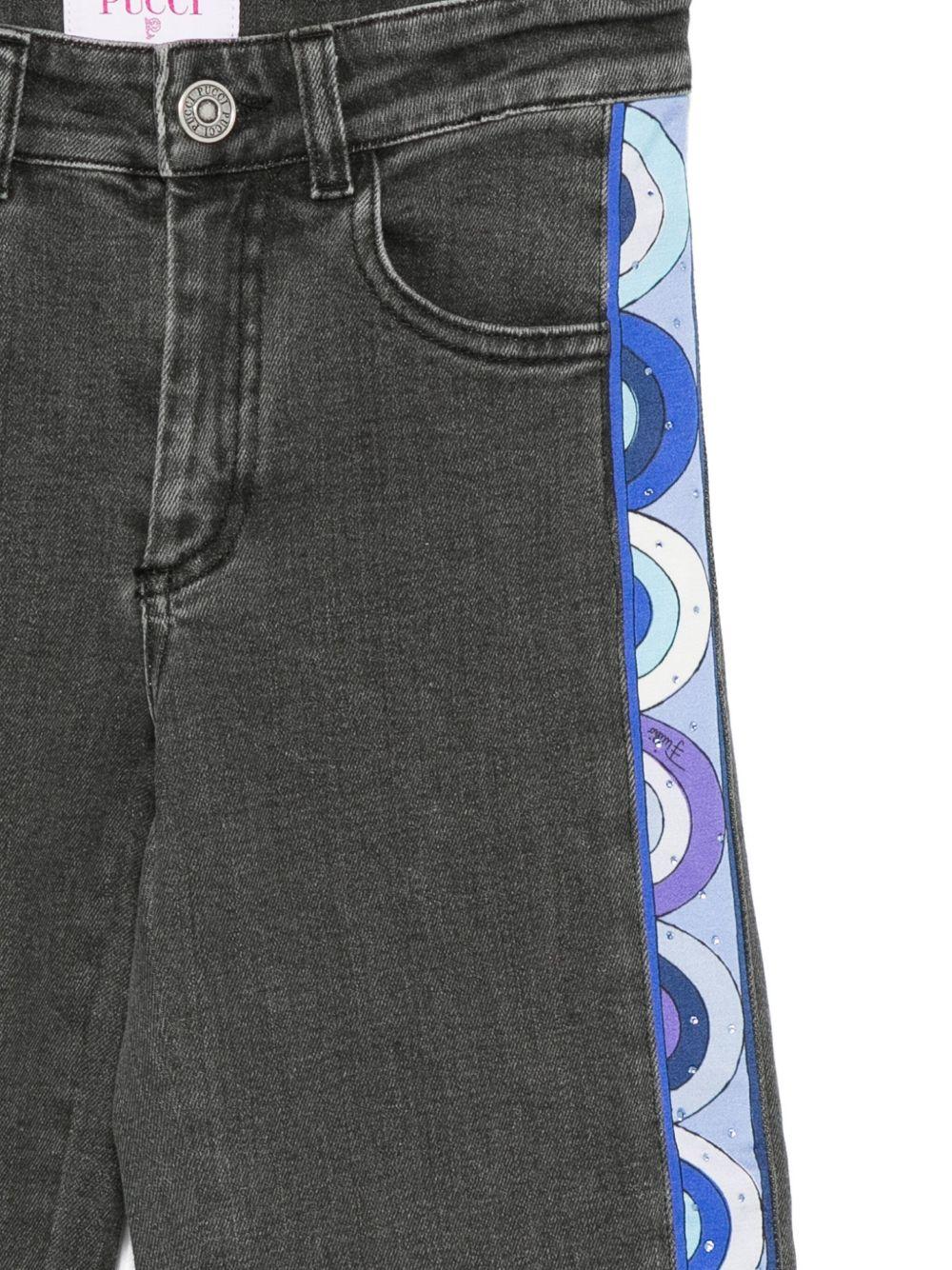 Jeans per bambina Emilio Pucci Junior in denim nero con stampa a righe laterali - Rubino Kids