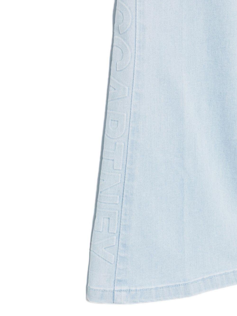 Jeans per bambina Stella McCartney Kids in denim con gamba a zampa - Rubino Kids