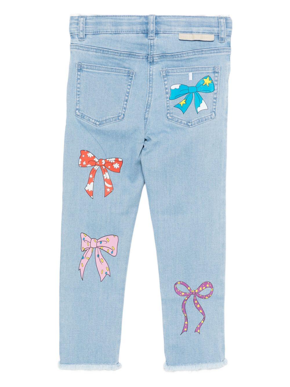 Jeans per bambina Stella McCartney Kids in denim con ricamo fiocco - Rubino Kids