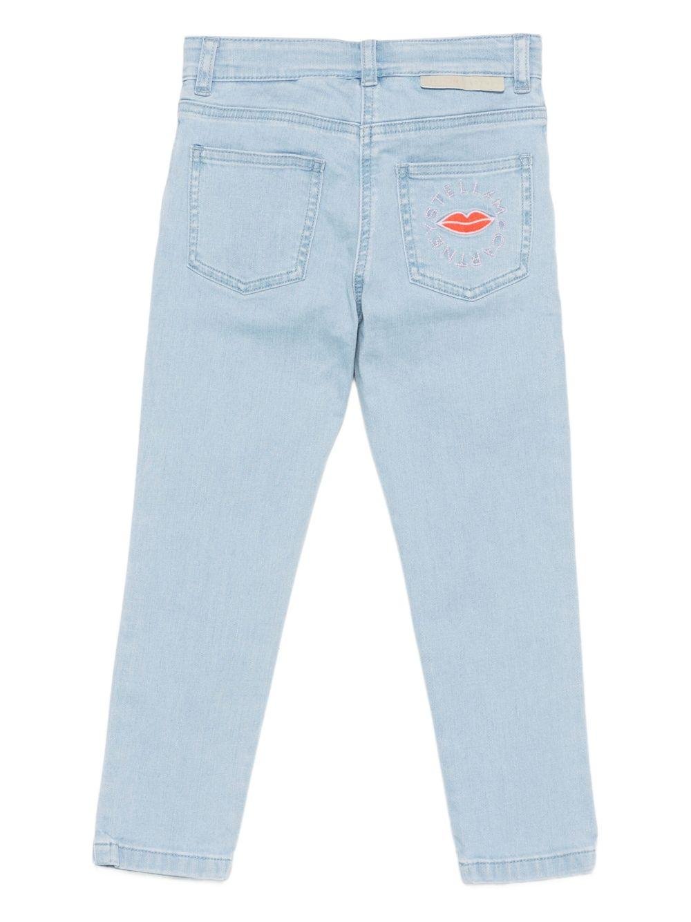 Jeans per bambina Stella McCartney Kids in denim con ricamo sulla tasca posteriore - Rubino Kids