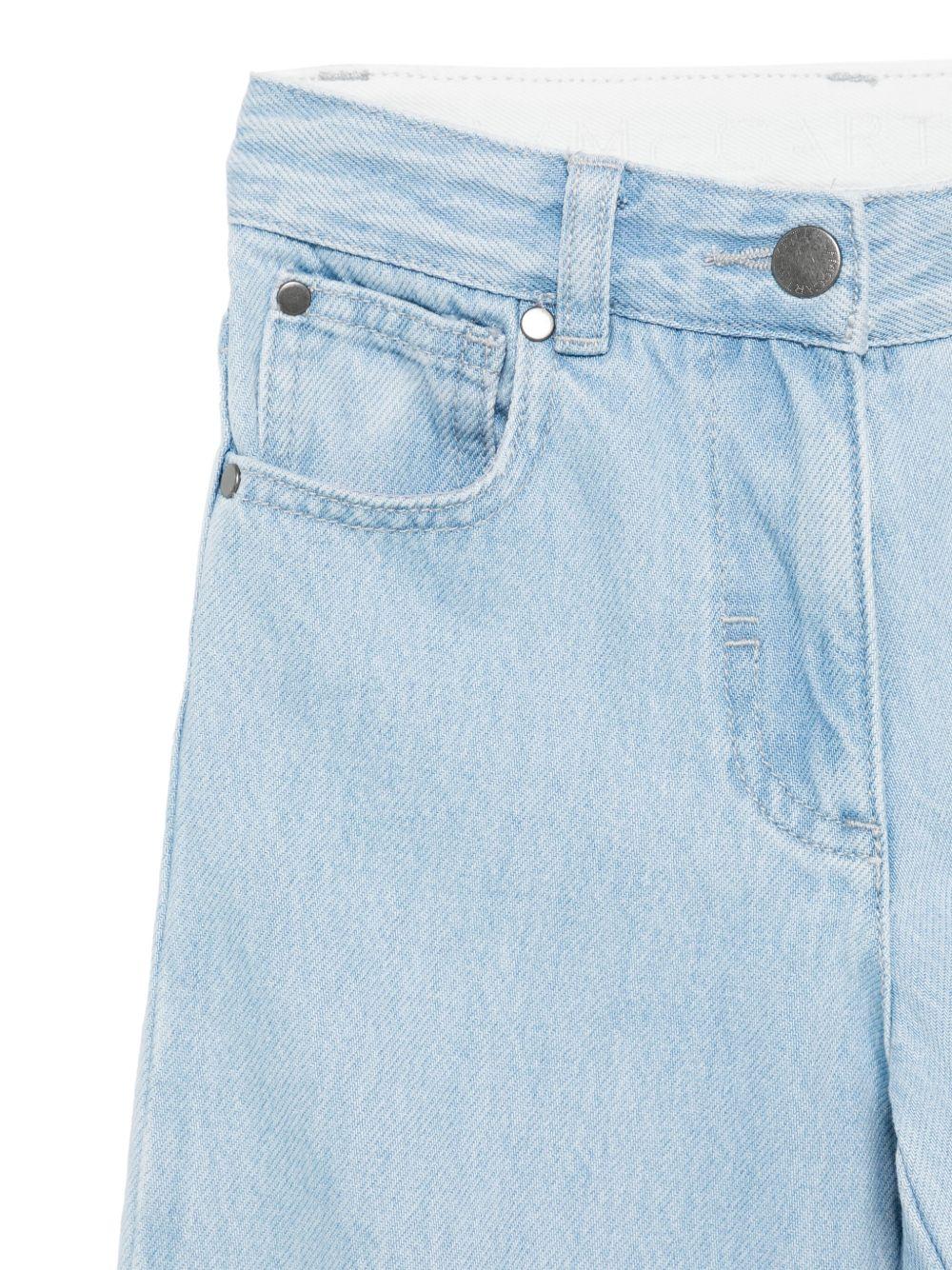 Jeans per bambina Stella McCartney Kids in denim con stampa floreale - Rubino Kids