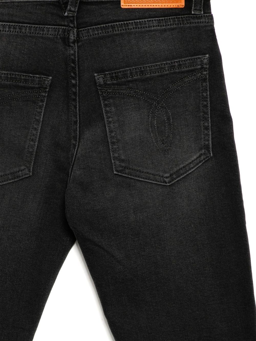 Jeans per bambina Versace Kids in denim nero modello dritto - Rubino Kids