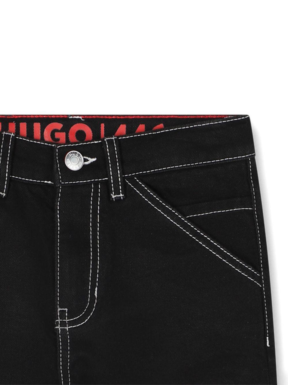 Jeans per bambino Hugo Kids neri con applicazione posteriore con logo - Rubino Kids