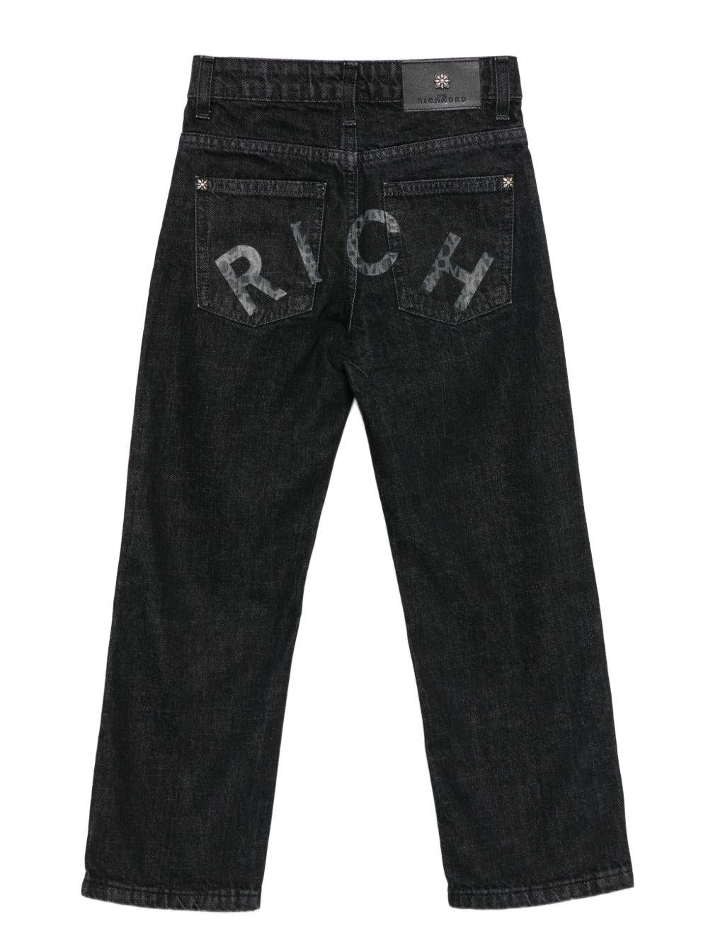 Jeans per bambino John Richmond Junior nero con placca logo - Rubino Kids