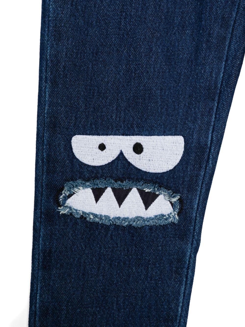 Jeans per bambino Stella McCartney Kids in denim con ricamo sul ginocchio - Rubino Kids