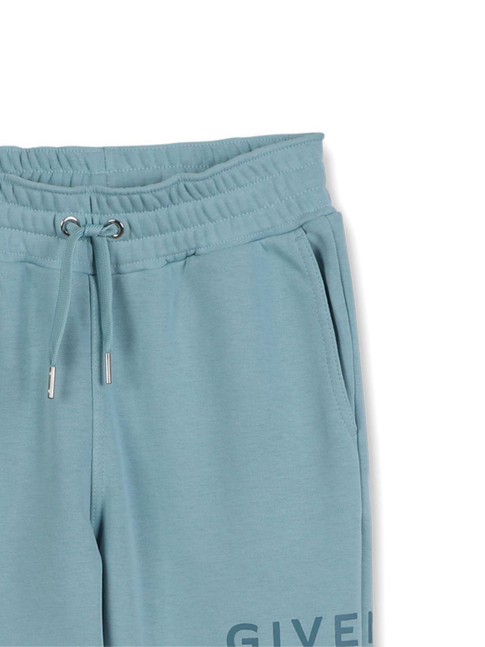 Joggers per bambino Givenchy Kids azzurro con logo sulla gamba - Rubino Kids