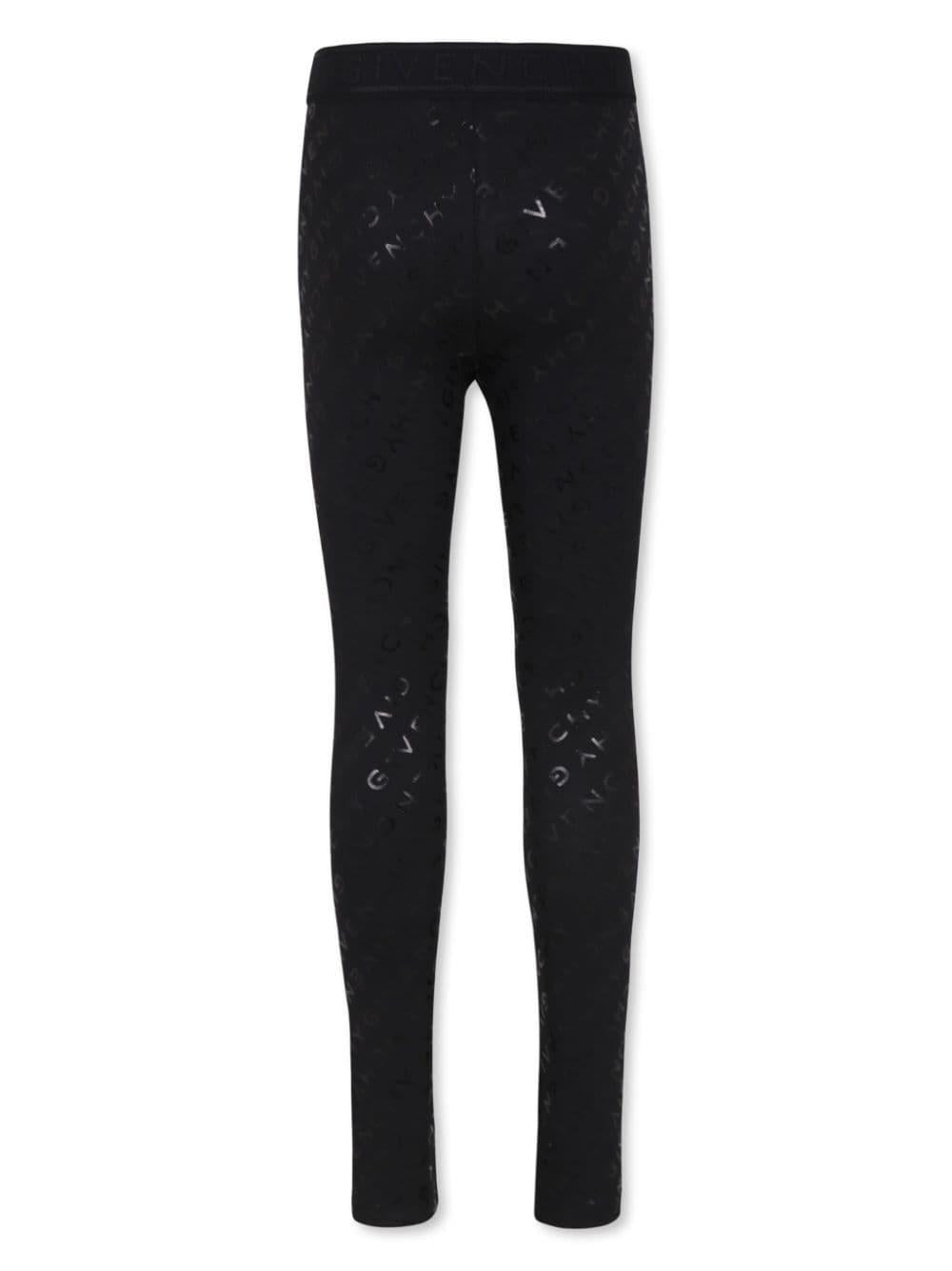 Leggings per bambina Givenchy Kids nero con stampa logo all - over - Rubino Kids