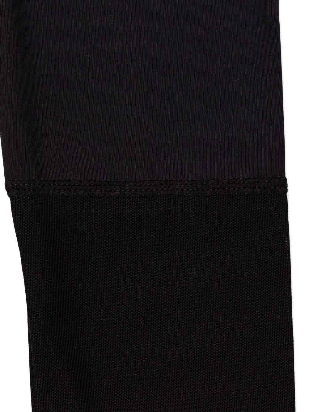 Leggings per bambina Stella McCartney Kids nero con stampa labbra - Rubino Kids