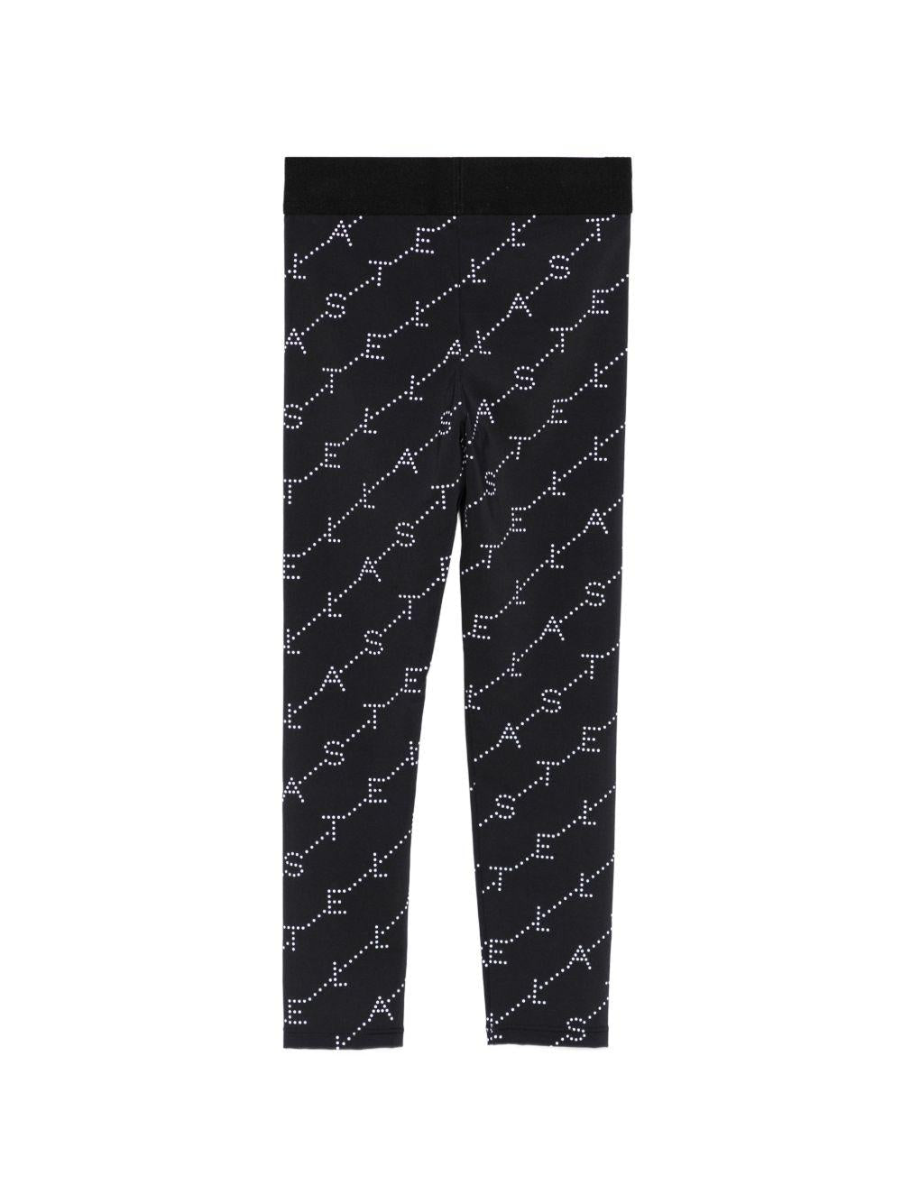 Leggins per bambina Stella McCartney Kids neri con stampa logo all - over - Rubino Kids