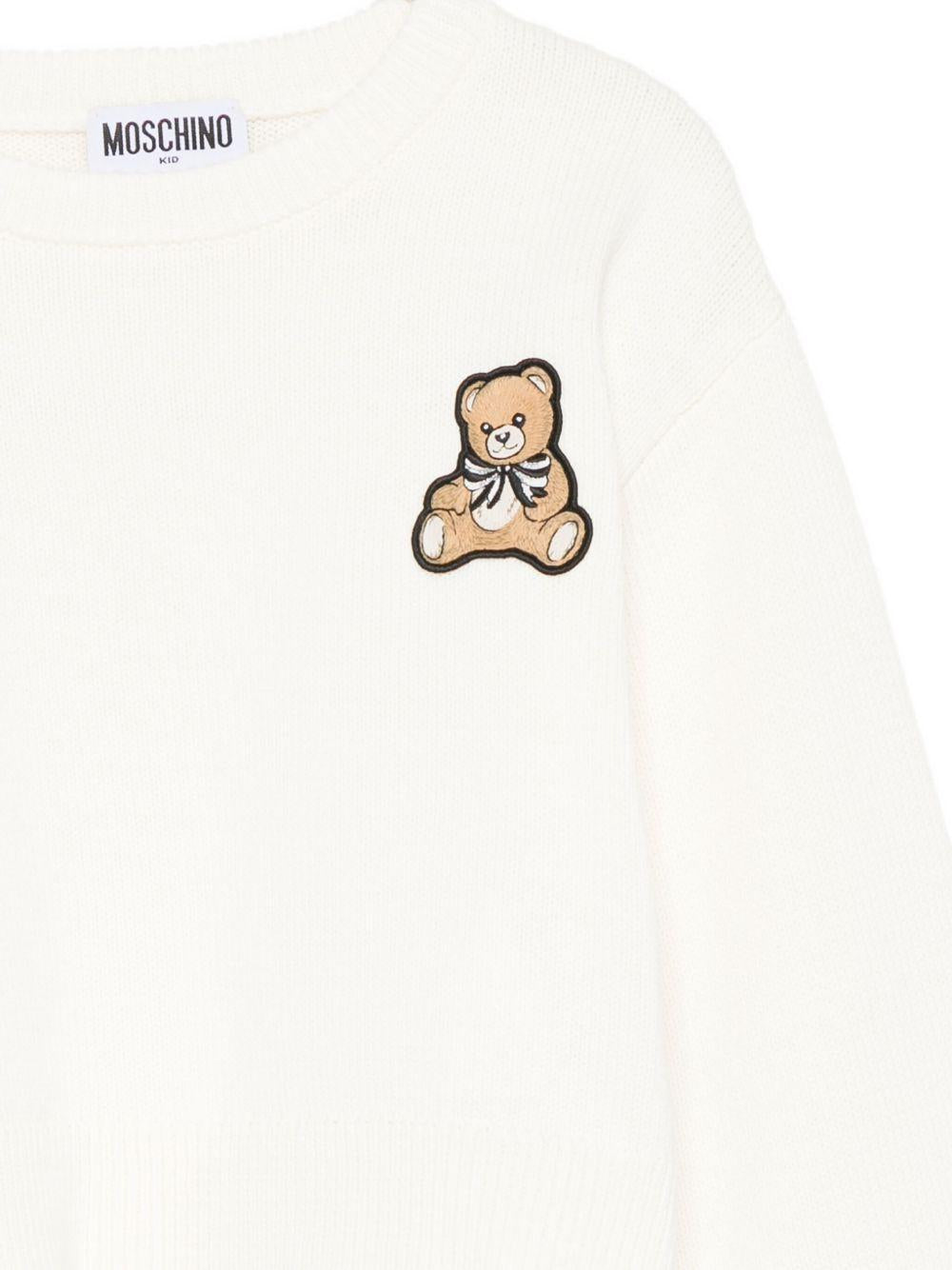 Maglione per bambina Moschino Kids bianco con applicazione Teddy Bear - Rubino Kids