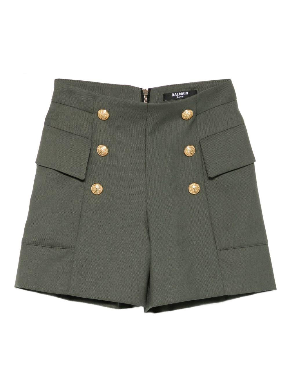 Pantaloncini per bambina Balmain Kids verde con tasche e bottoni - Rubino Kids