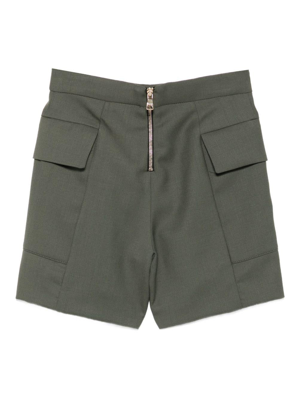 Pantaloncini per bambina Balmain Kids verde con tasche e bottoni - Rubino Kids