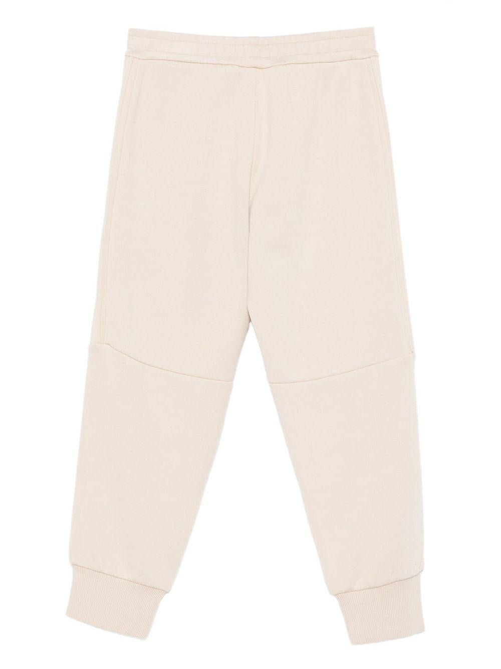 Pantaloni da tuta per bambino Emporio Armani Kids beige con logo - Rubino Kids
