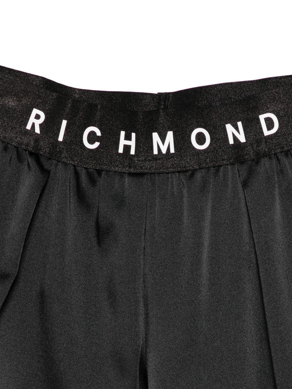 Pantaloni per bambina John Richmond Junior nero con logo - Rubino Kids