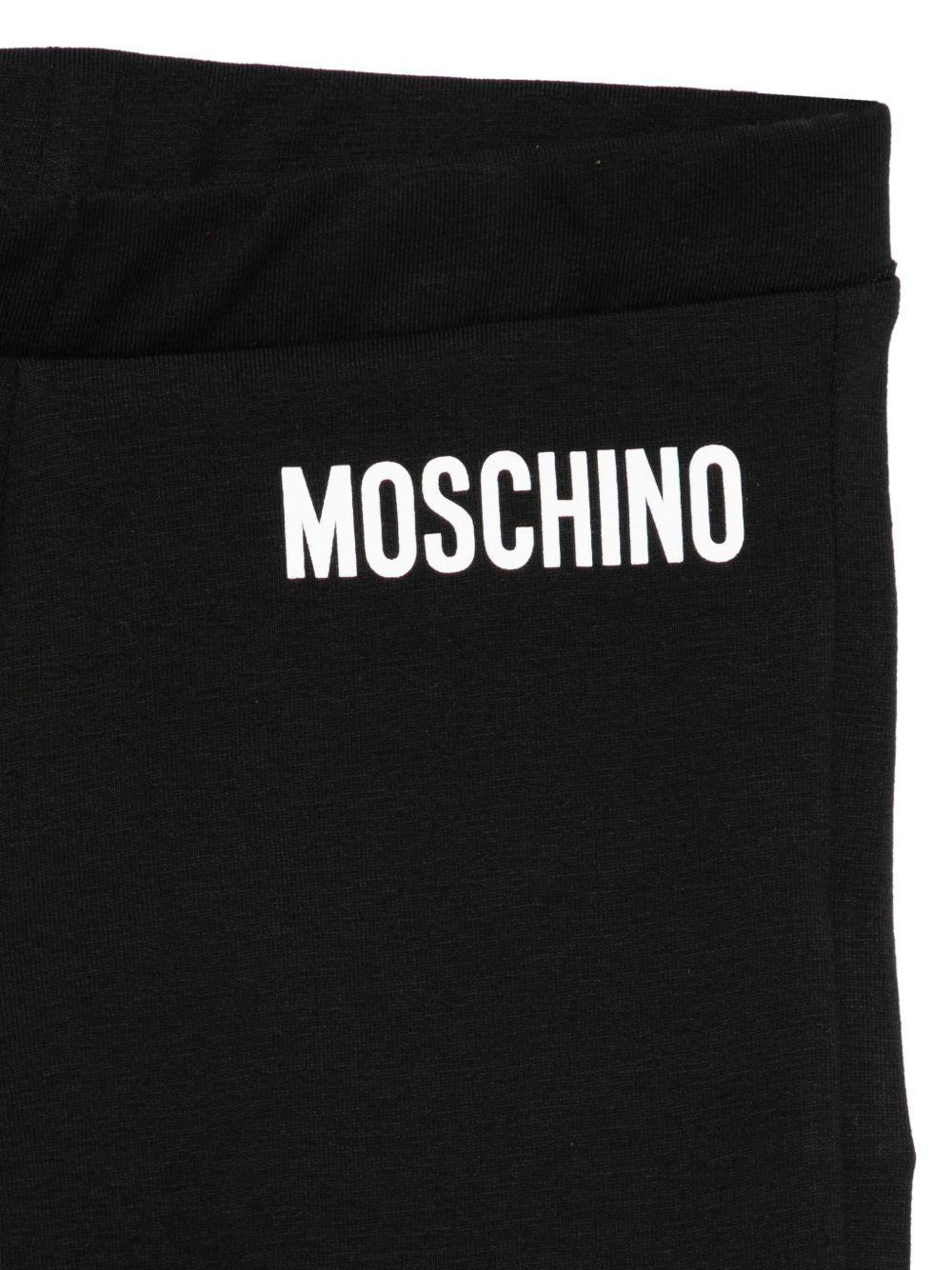 Pantaloni per bambina Moschino Kids neri svasati con decorazione logo - Rubino Kids