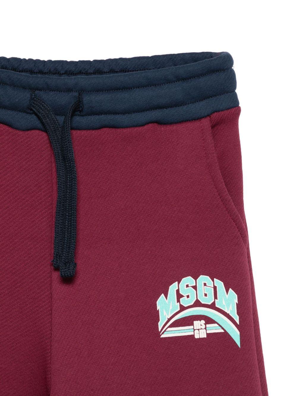 Pantaloni per bambina MSGM Kids rossi con stampa del logo - Rubino Kids
