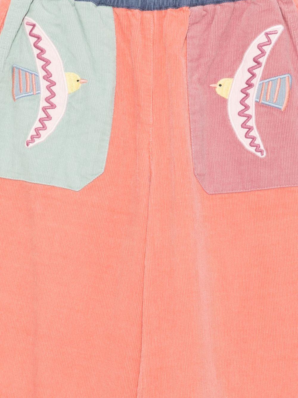 Pantaloni per bambina Stella McCartney Kids arancione a coste con ricamo - Rubino Kids