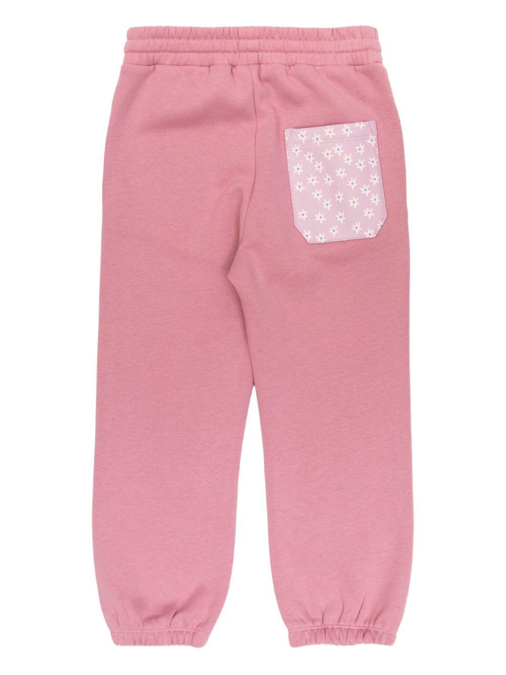Pantaloni per bambina Stella McCartney Kids rosa con tasca con stampa floreale - Rubino Kids