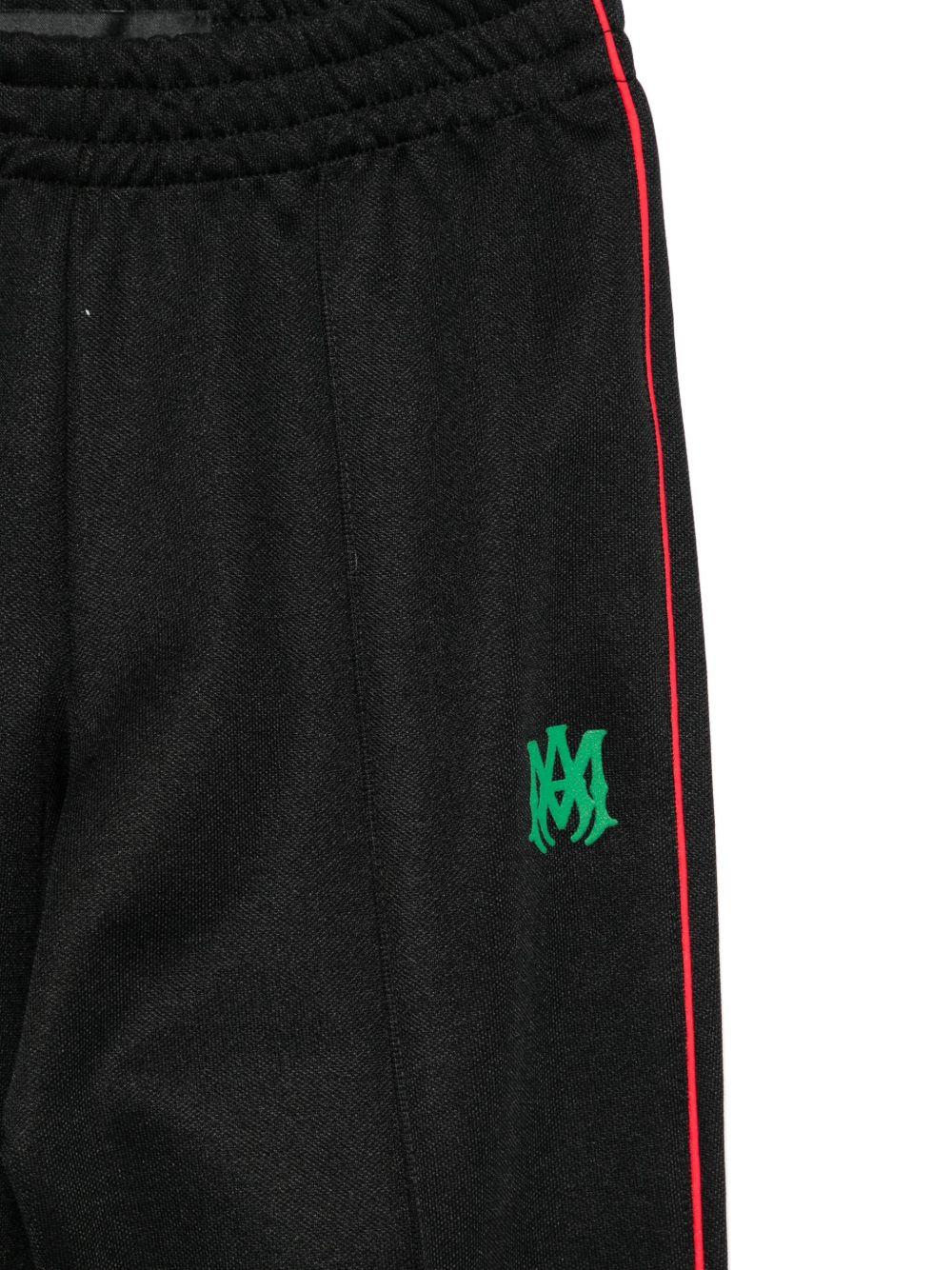 Pantaloni per bambino Amiri Kids neri con righe laterali - Rubino Kids