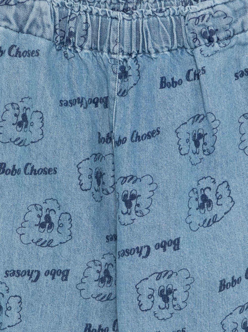 Pantaloni per bambino Bobo Choses denim con stampa Pickles The Dog all - over - Rubino Kids