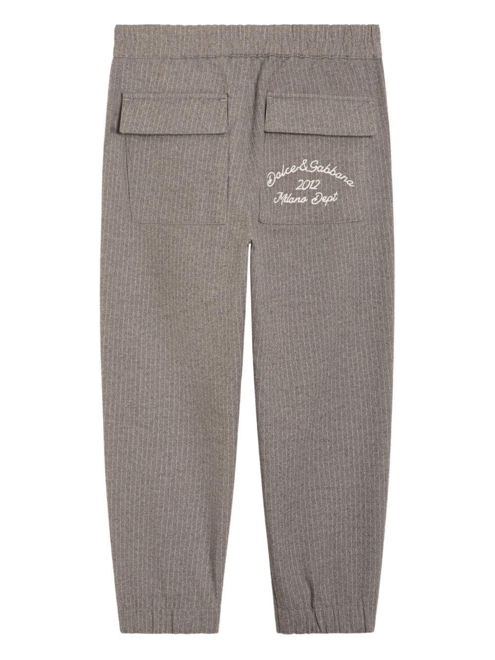 Pantaloni per bambino Dolce & Gabbana Kids grigi con motivo gessato - Rubino Kids