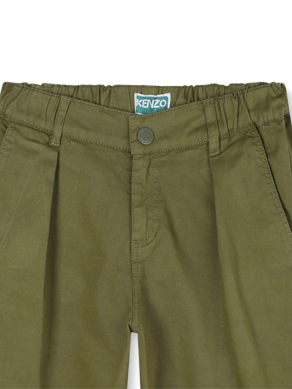 Pantaloni per bambino Kenzo Kids verdi con dettagli plissettati - Rubino Kids
