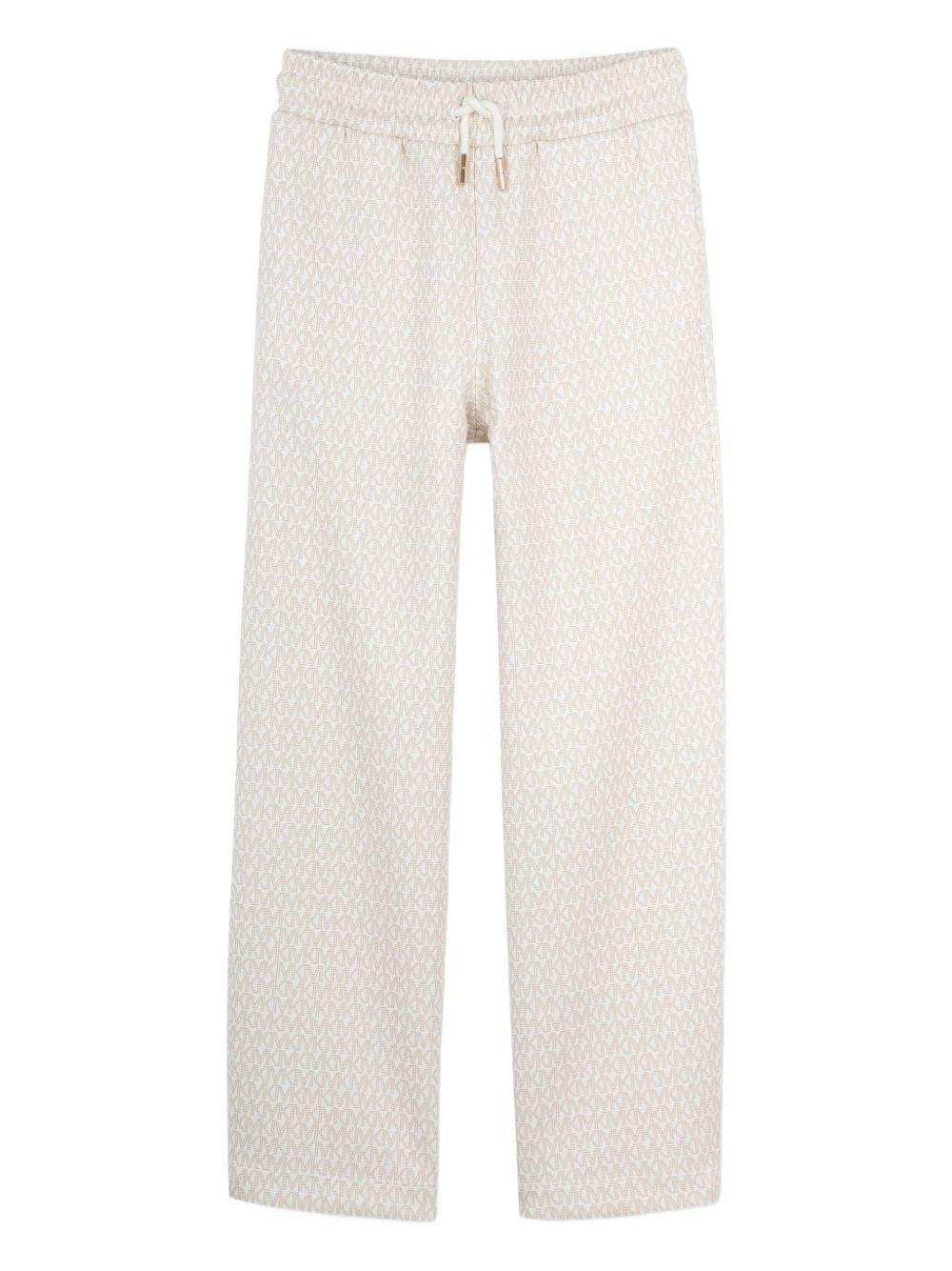 Pantaloni per bambino Michael Kors Kids bianchi con motivo all - over - Rubino Kids